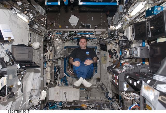NASA image: Chamitoff floats in the U.S. Laboratory during Joint Operations