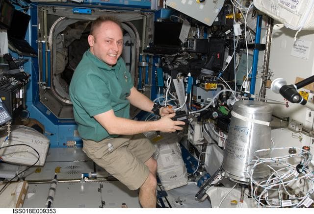 NASA image: ISS Expedition 18 Fincke works with Water Recovery System (WRS)