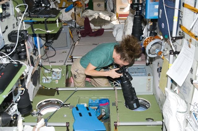 NASA image: ISS Expedition 18 Sandra Magnus in Service Module (SM) with cameras
