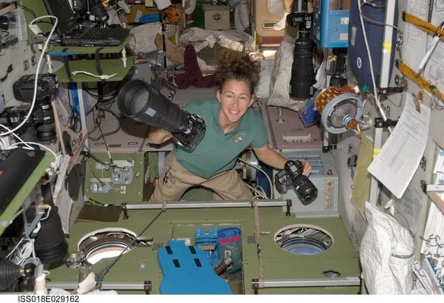 NASA image: ISS Expedition 18 Sandra Magnus in Service Module (SM) with cameras