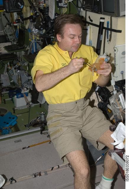 NASA image: Food Preparation in the Service Module (SM)