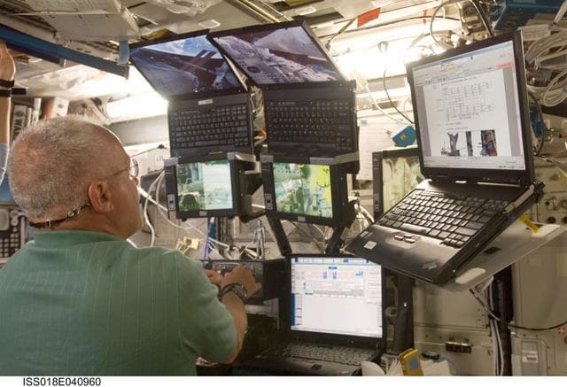 NASA image: Phillips and Magnus at RWS for S6 Truss Grapple OPS