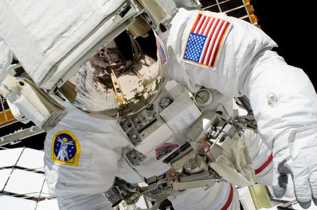 NASA image: STS-119 Extravehicular Activity (EVA) 1 Swanson in Extravehicular Mobility Unit (EMU)