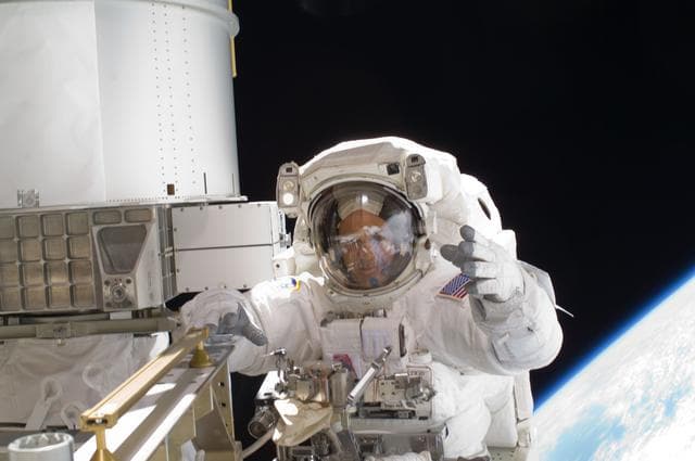 NASA image: STS-119 Extravehicular Activity (EVA) 1 Arnold in Extravehicular Mobility Unit (EMU)