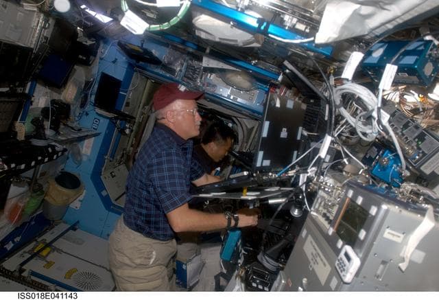 NASA image: Phillips and Wakata Space Station Remote Manipulator System (SSRMS) Support for STS-119 Extravehicular Activity (EVA) 1