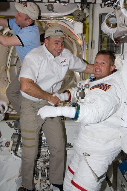 NASA image: STS-119 Extravehicular Activity (EVA) 1 Extravehicular Mobility Unit (EMU) Doff