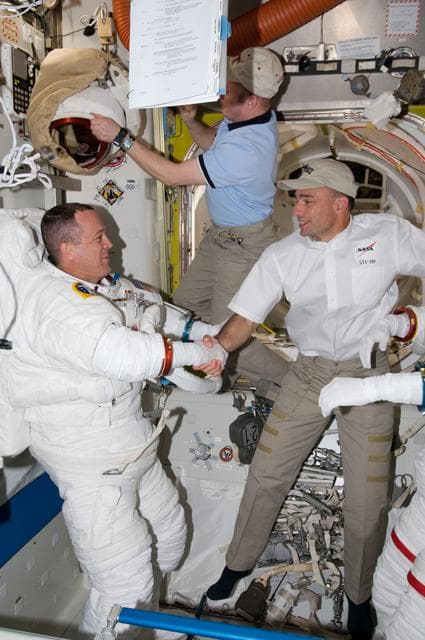 NASA image: STS-119 Extravehicular Activity (EVA) 1 Extravehicular Mobility Unit (EMU) Doff