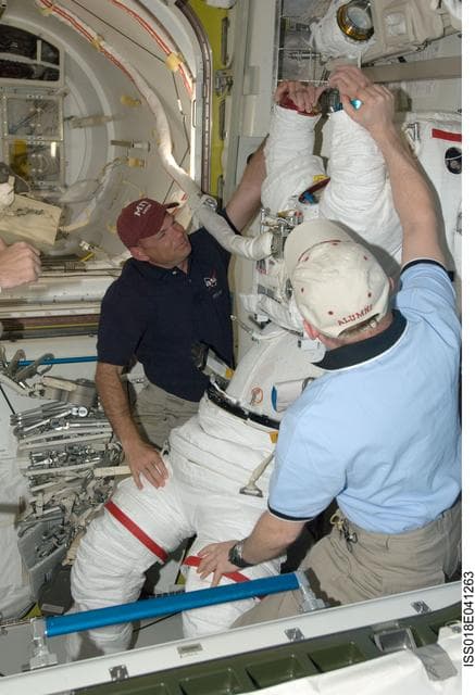 NASA image: STS-119 Extravehicular Activity (EVA) 1 Extravehicular Mobility Unit (EMU) Doff