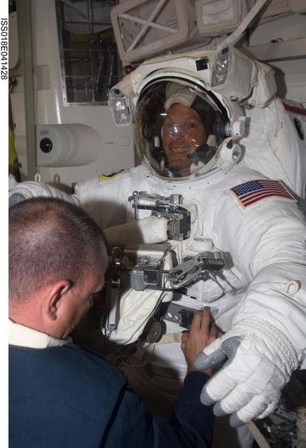 NASA image: STS-119 Extravehicular Activity (EVA) 2 Extravehicular Mobility Unit (EMU) Doff