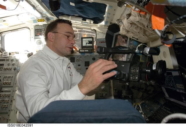 NASA image: Archambault reviews procedures on Middeck (MDDK)