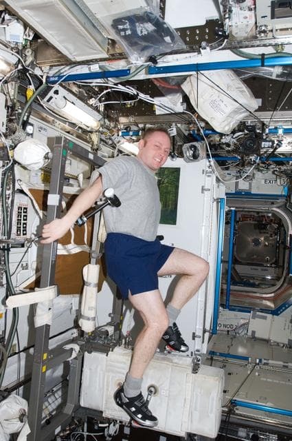 NASA image: Fincke uses Cycle Ergometer with Vibration Isolation System (CEVIS)