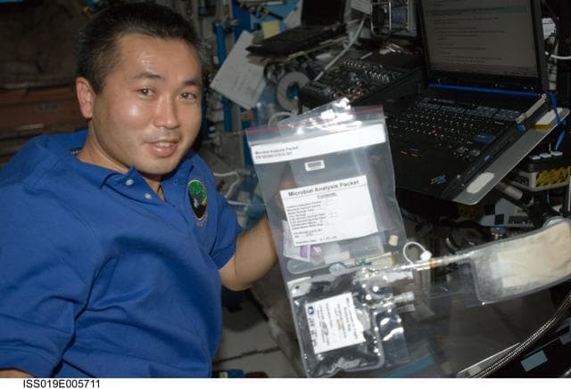 NASA image: Wakata with Microbial Analysis Packet