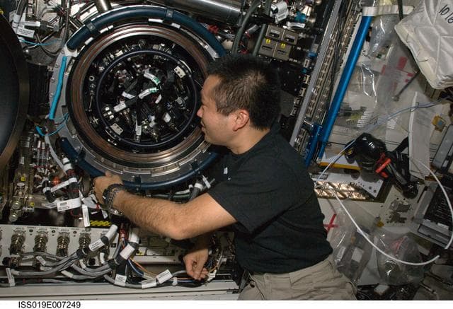 NASA image: Wakata with MDCA during: Fuel Reservoir Replacement