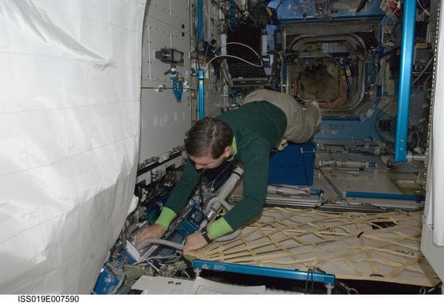 NASA image: Barrett cleaning filters in U.S. Laboratory