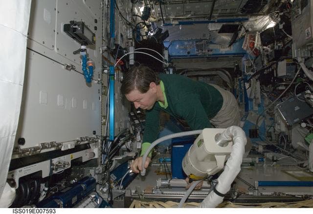NASA image: Barrett cleaning filters in U.S. Laboratory