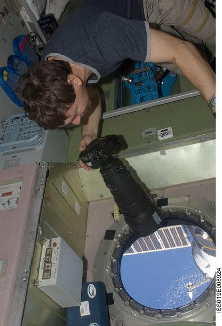 NASA image: Barratt with camera at SM window