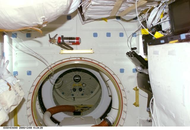NASA image: View in PMA-3 looking into connecting tunnel