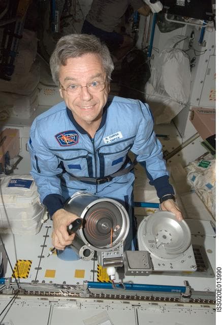 NASA image: Thirsk performs IFM on cable cartridge