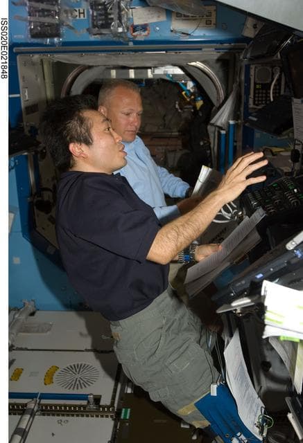NASA image: Wakata and Hurley at SSRMS controls