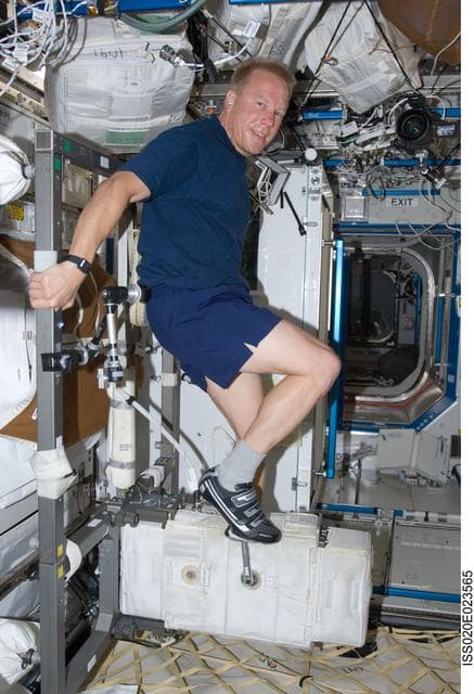 NASA image: Kopra on ergometer in U.S. Lab