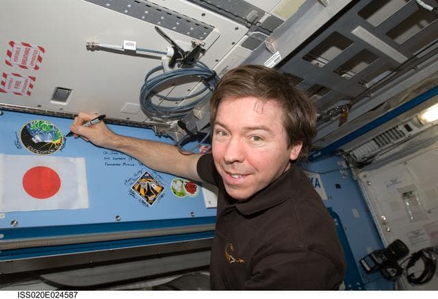 NASA image: Barratt with Expedition 19 patch in JPM