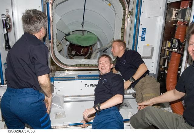 NASA image: ISS crew in Node 2 awaiting STS-128 docking