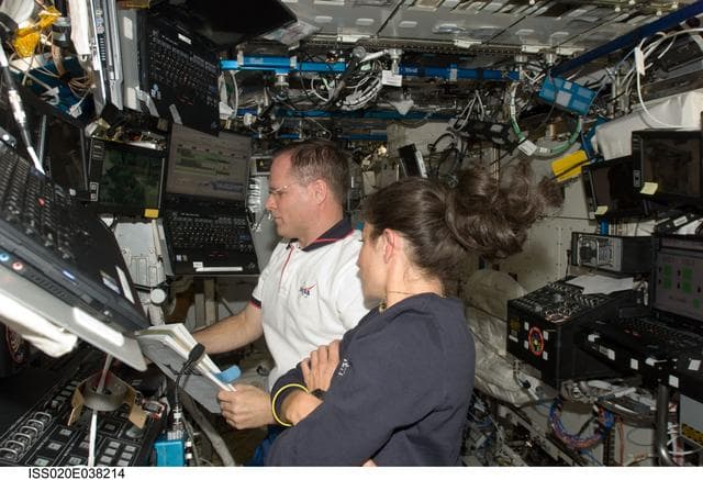 NASA image: EVA2 - Ford and Stott at SSRMS controls