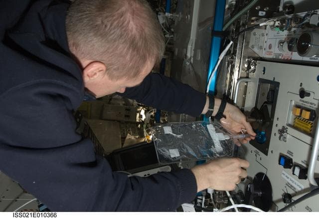 NASA image: CDR De Winne takes Water Samples for analysis in the US Lab