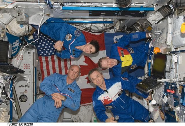 NASA image: Expedition 21 Crew Members pose for a photo in the Node 2