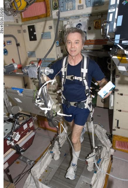 NASA image: FE Thirsk exercises on the TVIS in the SM
