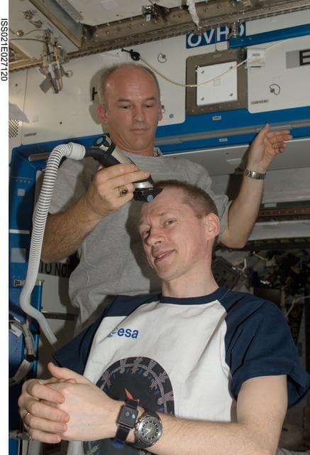 NASA image: Expedition 21 Crew Haircuts