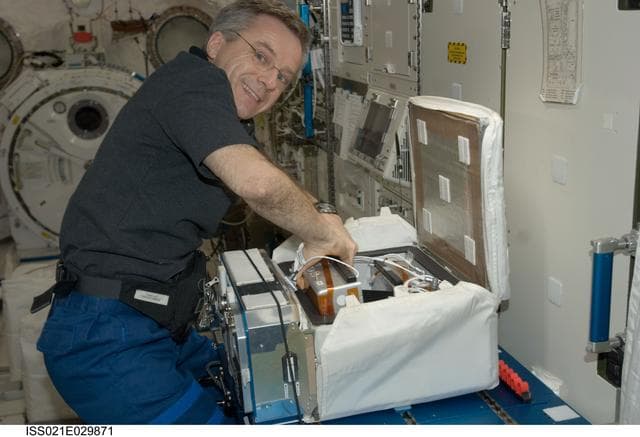 NASA image: Expedition 21 FE Thirsk installs the new CSI-03
