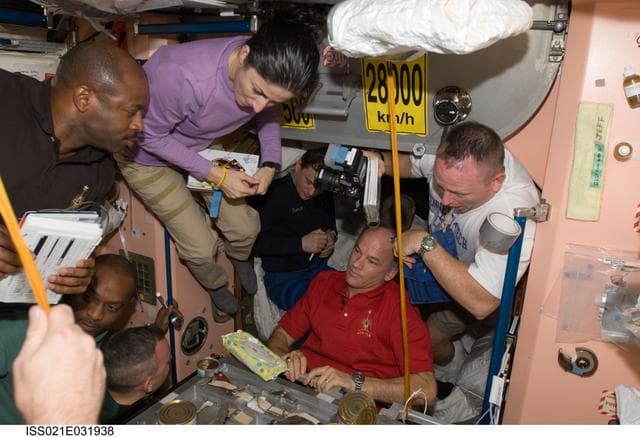 NASA image: View of Expedition 21/STS-129 Crew Members in the Node 1