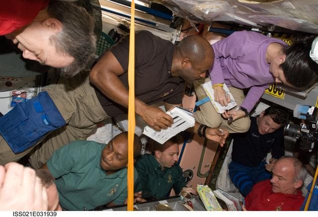 NASA image: View of Expedition 21/STS-129 Crew Members in the Node 1