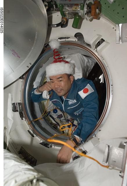NASA image: Noguchi in the hatch area upon arrival to the ISS during Expedition 22