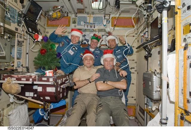 NASA image: Expedition 22 Crewmembers in the SM during Expedition 22