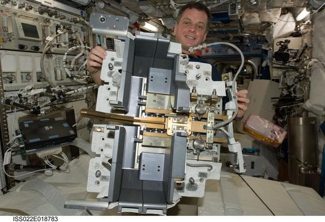 NASA image: Creamer works with JEMRMS SFA in the COF during Expedition 22