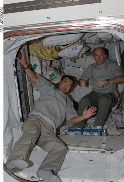 NASA image: Noguchi and Williams in hatch area during Expedition 22