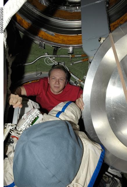 NASA image: Kotov in the Transfer Compartment of the SM during Expedition 22