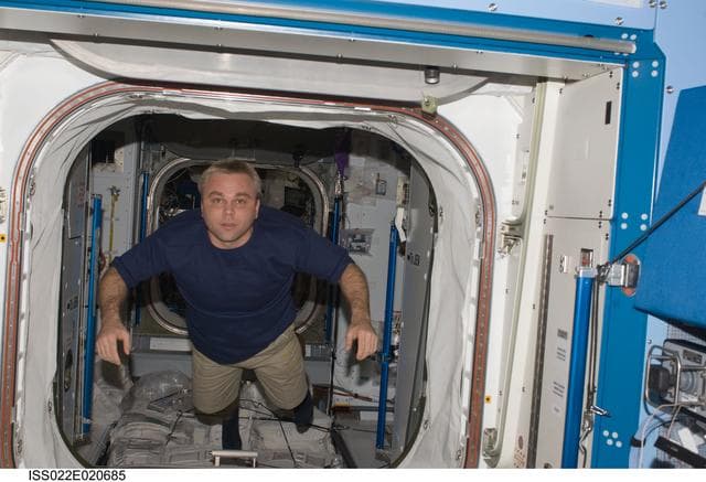 NASA image: Suraev in the hatch area of the JPM during Expedition 22
