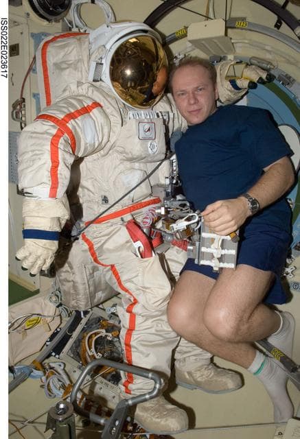 NASA image: Kotov works on Orlan-MK Suit in the Pirs DC-1 during Expedition 22