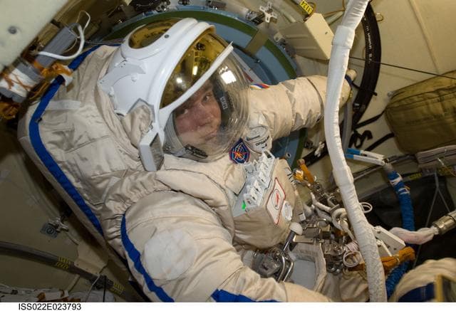 NASA image: Suraev wearing Russian Orlan Spacesuit in the Pirs DC-1 during Expedition 22