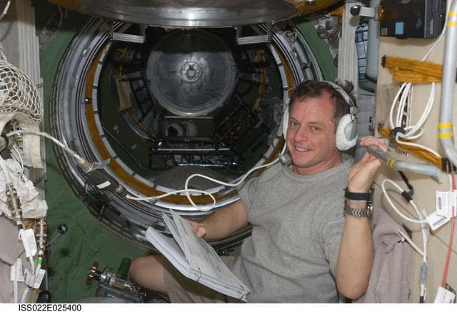 NASA image: Creamer uses communication equipment in the FGB during Expedition 22