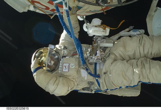 NASA image: Suraev works at SM during EVA 24