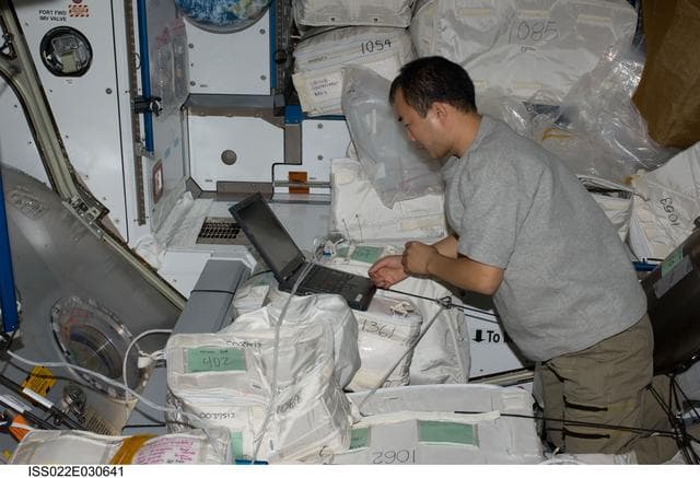 NASA image: Noguchi uses laptop computer in the Node 2 during Expedition 22