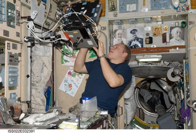 NASA image: Kotov uses laptop computer in the SM during Expedition 22
