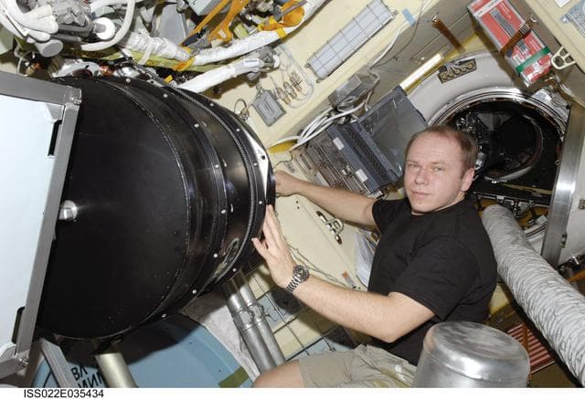 NASA image: Kotov works with Plasma Crystal-3+ Experiment in the SM during Expedition 22