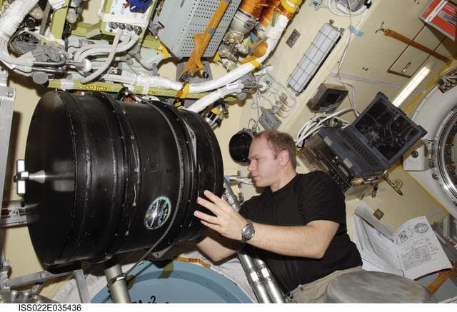 NASA image: Kotov works with Plasma Crystal-3+ Experiment in the SM during Expedition 22