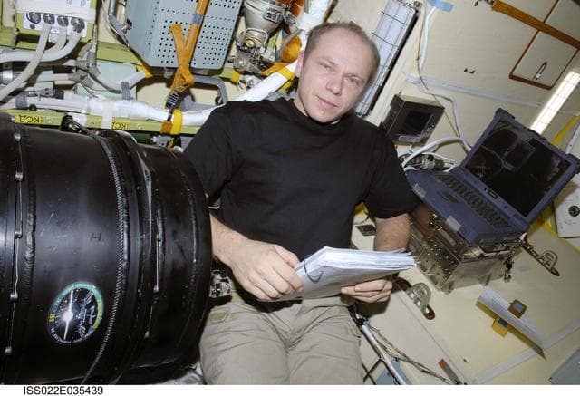 NASA image: Kotov works with Plasma Crystal-3 Experiment in the SM during Expedition 22