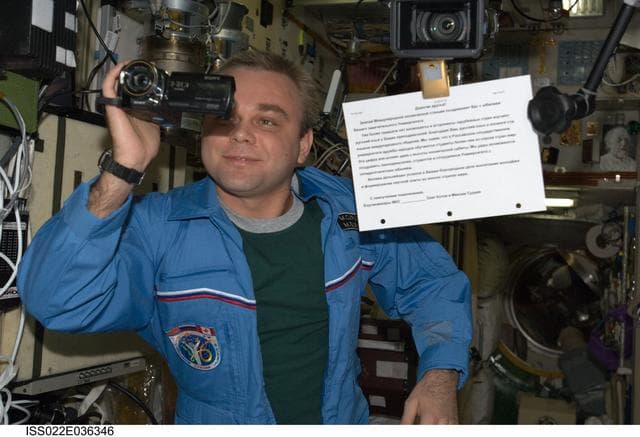 NASA image: Suraev uses High Definition Camcorder in the SM during Expedition 22